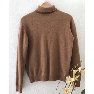 100% Pure Camel Hair Turtle Neck Sweater.